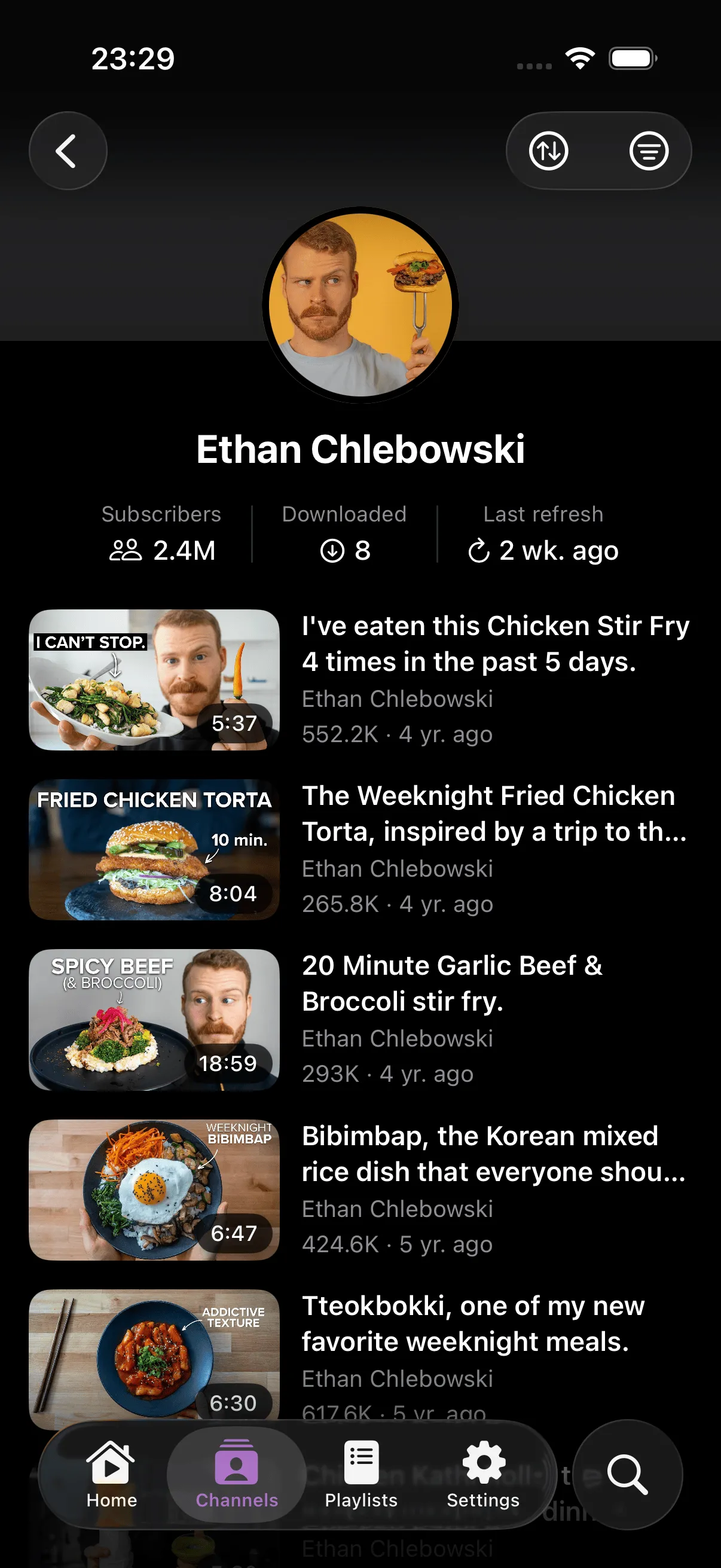 Channel detail view with parallax banner, stats, and video list